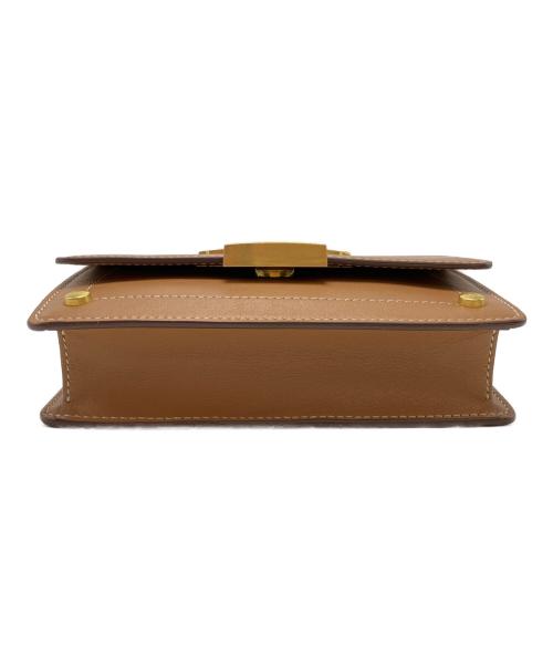 TOD'S（トッズ）TOD'S (トッズ) Tタイムレス ブラウンの古着・服飾アイテム