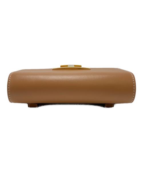 TOD'S（トッズ）TOD'S (トッズ) Tタイムレス ブラウンの古着・服飾アイテム