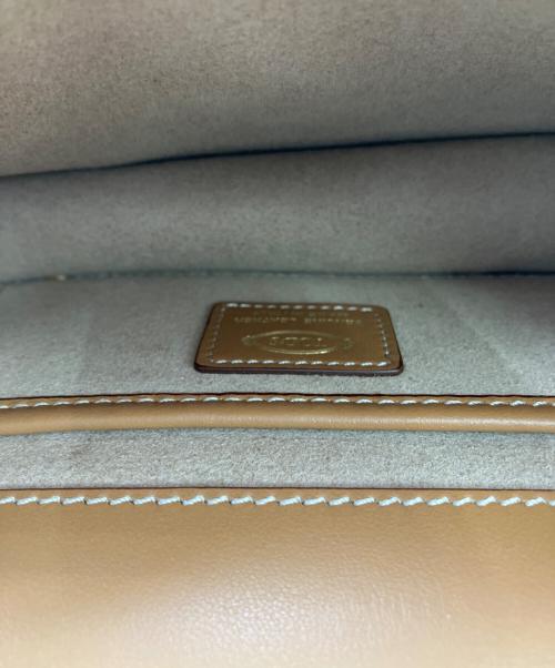TOD'S（トッズ）TOD'S (トッズ) Tタイムレス ブラウンの古着・服飾アイテム