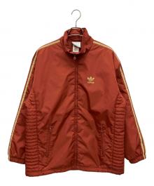 adidas（アディダス）の古着「中綿ジャケット」｜オレンジ