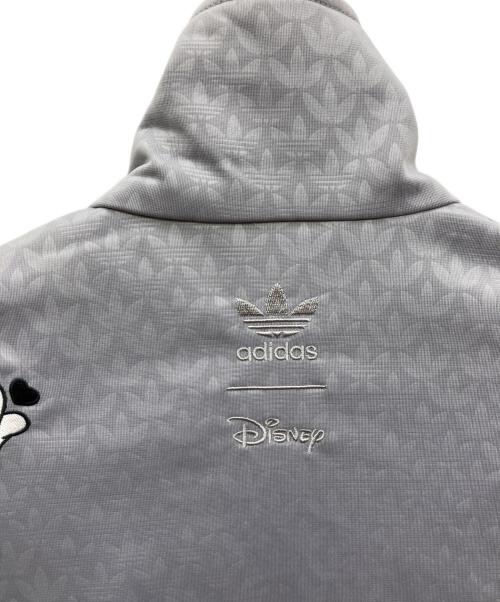 adidas（アディダス）adidas (アディダス) DISNEY (ディズニー) ミッキーマウス × Originals モノグラム刺しゅう ファイヤーバード トラックトップ グレー サイズ:SIZE Mの古着・服飾アイテム