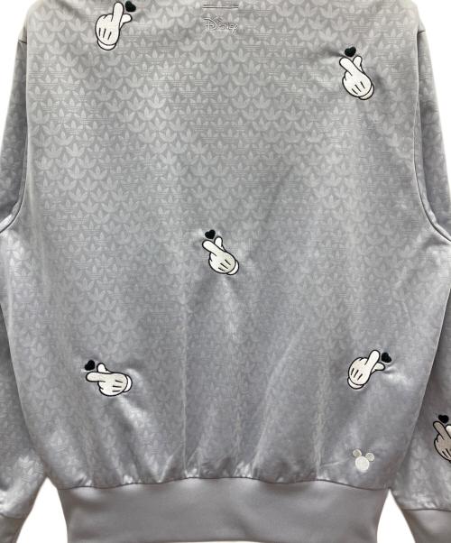 adidas（アディダス）adidas (アディダス) DISNEY (ディズニー) ミッキーマウス × Originals モノグラム刺しゅう ファイヤーバード トラックトップ グレー サイズ:SIZE Mの古着・服飾アイテム