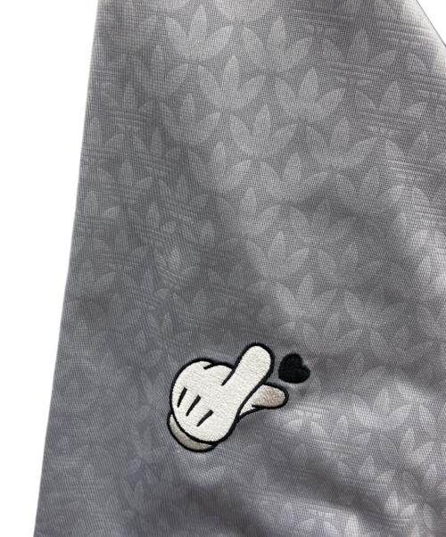 adidas（アディダス）adidas (アディダス) DISNEY (ディズニー) ミッキーマウス × Originals モノグラム刺しゅう ファイヤーバード トラックトップ グレー サイズ:SIZE Mの古着・服飾アイテム