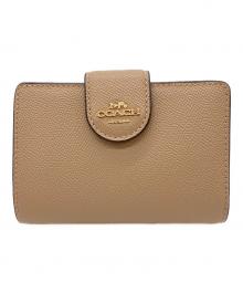 COACH（コーチ）の古着「2つ折り財布」｜ベージュ
