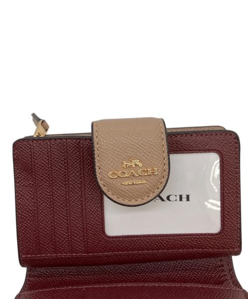 COACH（コーチ）COACH (コーチ) 2つ折り財布 ベージュ 未使用品の古着・服飾アイテム