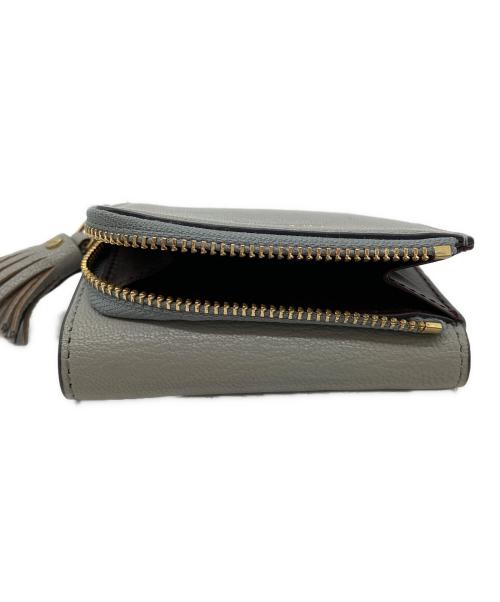 ANYA HINDMARCH（アニヤ・ハインドマーチ）ANYA HINDMARCH (アニヤ・ハインドマーチ) UNITED ARROWS (ユナイテッドアローズ) コンパクトウォレット グレーの古着・服飾アイテム