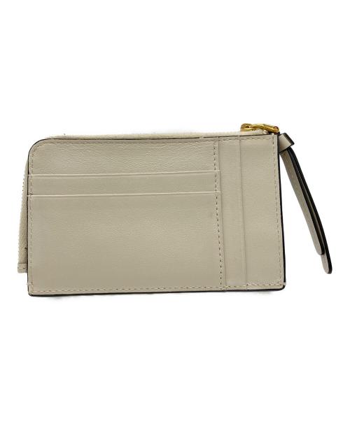 TOD'S（トッズ）TOD'S (トッズ) フラグメントケース アイボリーの古着・服飾アイテム