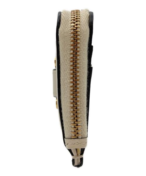 TOD'S（トッズ）TOD'S (トッズ) フラグメントケース アイボリーの古着・服飾アイテム