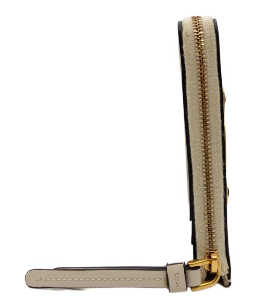 TOD'S（トッズ）TOD'S (トッズ) フラグメントケース アイボリーの古着・服飾アイテム