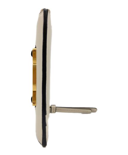 TOD'S（トッズ）TOD'S (トッズ) フラグメントケース アイボリーの古着・服飾アイテム