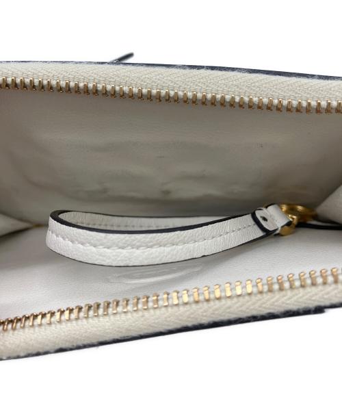 TOD'S（トッズ）TOD'S (トッズ) フラグメントケース アイボリーの古着・服飾アイテム
