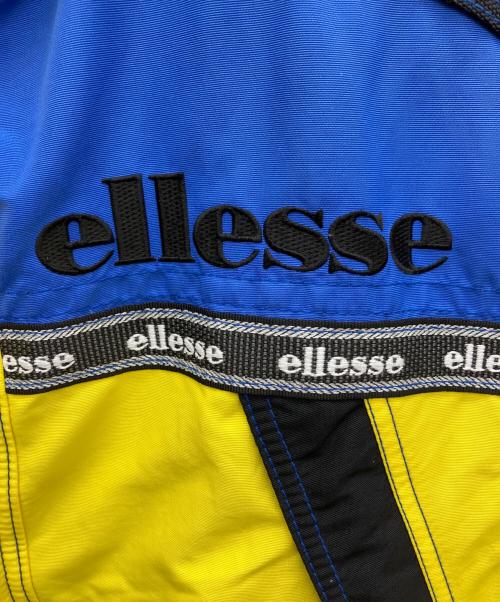 ellesse（エレッセ）ellesse (エレッセ) アノラックパーカー イエロー×ブルー サイズ:Mの古着・服飾アイテム