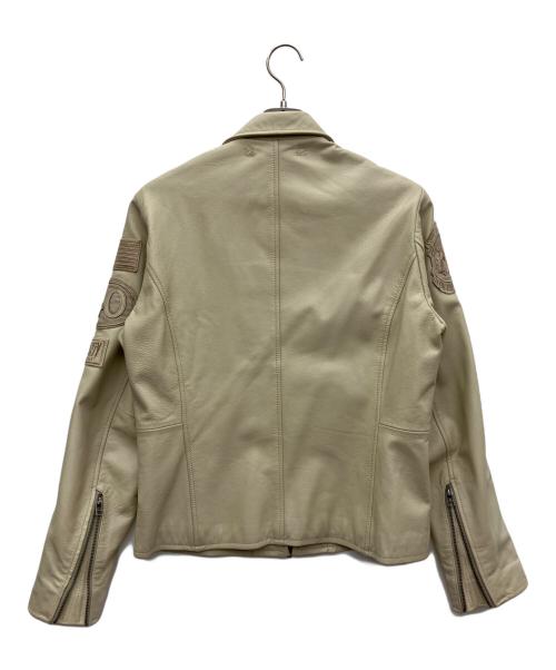 AVIREX（アヴィレックス）AVIREX (アヴィレックス) PATCHED TRUCKER JACKET ベージュ サイズ:Mの古着・服飾アイテム