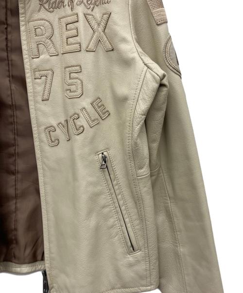 AVIREX（アヴィレックス）AVIREX (アヴィレックス) PATCHED TRUCKER JACKET ベージュ サイズ:Mの古着・服飾アイテム