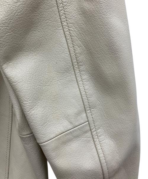 AVIREX（アヴィレックス）AVIREX (アヴィレックス) PATCHED TRUCKER JACKET ベージュ サイズ:Mの古着・服飾アイテム