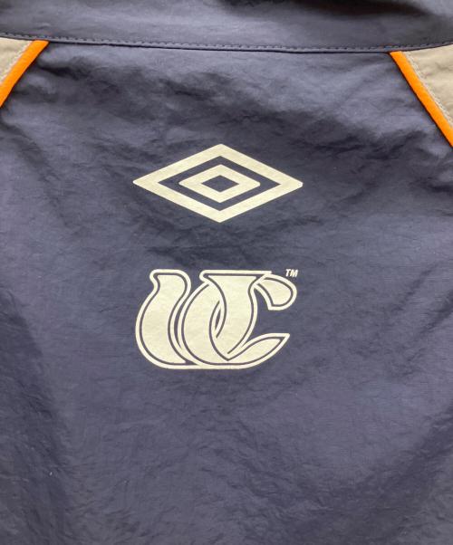UMBRO（アンブロ）UMBRO (アンブロ) JUN RED (ジュン レッド) ナイロンジャケット ネイビー サイズ:Lの古着・服飾アイテム