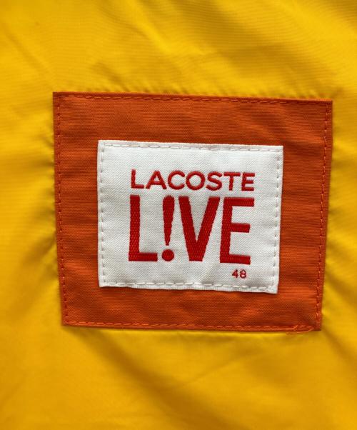 LACOSTE LIVE（ラコステライブ）LACOSTE LIVE (ラコステライブ) ダウンベスト オレンジ×グリーン サイズ:48の古着・服飾アイテム