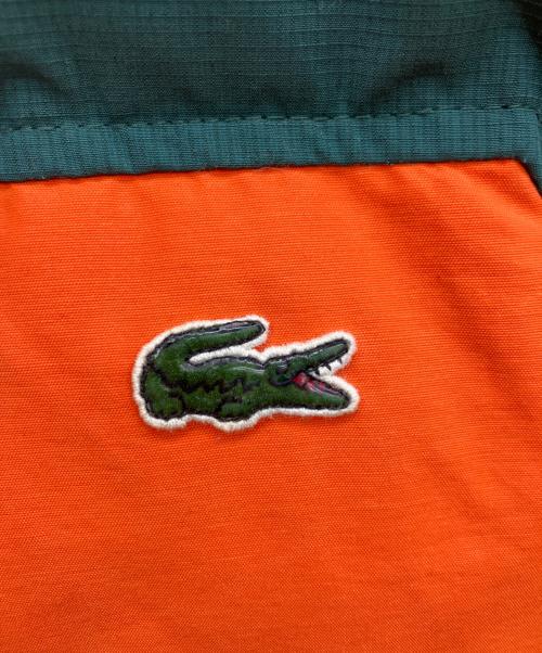 LACOSTE LIVE（ラコステライブ）LACOSTE LIVE (ラコステライブ) ダウンベスト オレンジ×グリーン サイズ:48の古着・服飾アイテム
