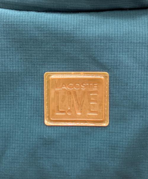 LACOSTE LIVE（ラコステライブ）LACOSTE LIVE (ラコステライブ) ダウンベスト オレンジ×グリーン サイズ:48の古着・服飾アイテム