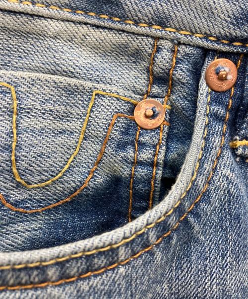 EVISU（エヴィス）EVISU (エヴィス) エクリュ大黒プリント ルーズフィット ジーンズ #2038 インディゴ サイズ:W31の古着・服飾アイテム