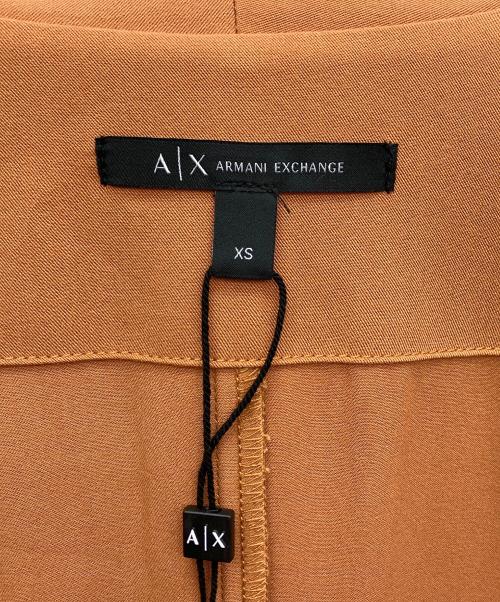ARMANI EXCHANGE（アルマーニ エクスチェンジ）ARMANI EXCHANGE (アルマーニ エクスチェンジ) ベルト・アジャスタブルスリーブ付き リラックスシルエットコート オレンジ サイズ:XSの古着・服飾アイテム
