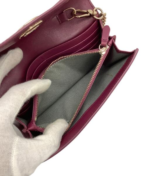 COLE HAAN（コールハーン）COLE HAAN (コールハーン) ターンロックウォレット パープルの古着・服飾アイテム