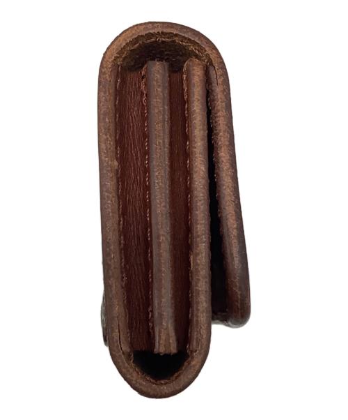 LARRY SMITH（ラリースミス）LARRY SMITH (ラリースミス) SHELL CONCHO CAR CASE ブラウンの古着・服飾アイテム