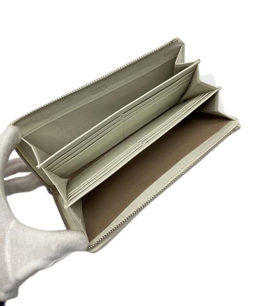 HIROKO HAYASHI（ヒロコ ハヤシ）HIROKO HAYASHI (ヒロコ ハヤシ) 長財布 オレンジの古着・服飾アイテム