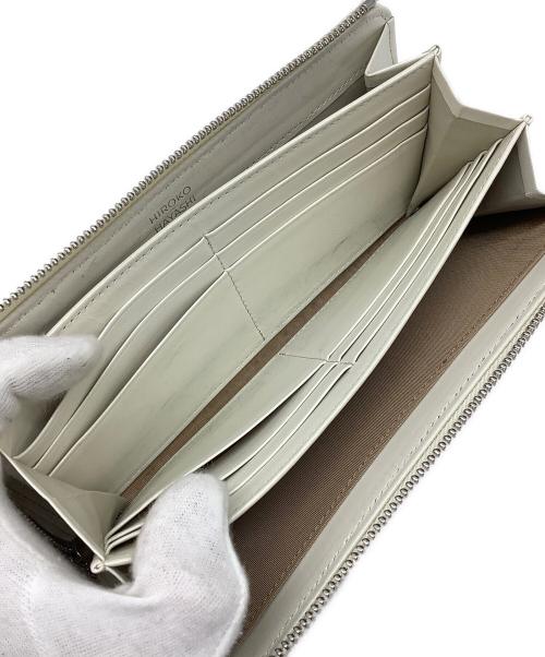 HIROKO HAYASHI（ヒロコ ハヤシ）HIROKO HAYASHI (ヒロコ ハヤシ) 長財布 オレンジの古着・服飾アイテム