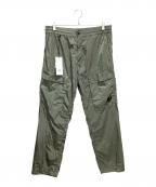 C.P COMPANYシーピーカンパニー）の古着「レンズとペンポケットカーゴパンツ」｜カーキ