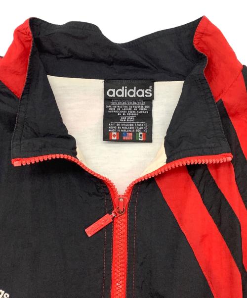 adidas（アディダス）adidas (アディダス) ナイロンジャケット ブラック×レッド サイズ:XLの古着・服飾アイテム