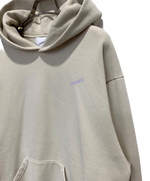 coperni（コペルニ）COPERNI (コペルニ) ロゴプリントプルオーバーパーカー ベージュ×パープル サイズ:Mの古着・服飾アイテム