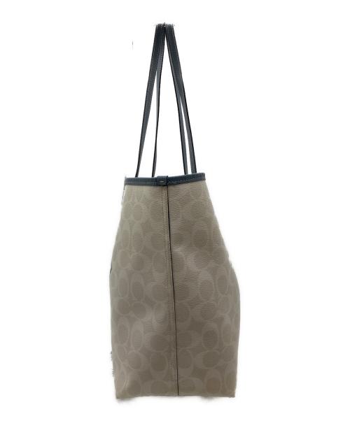 COACH（コーチ）COACH (コーチ) シグネチャー カレッジロゴ トートバッグ スカイブルーの古着・服飾アイテム
