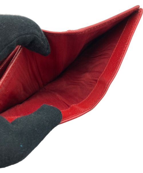 PRADA（プラダ）PRADA (プラダ) 2つ折り財布 レッド×ゴールドの古着・服飾アイテム