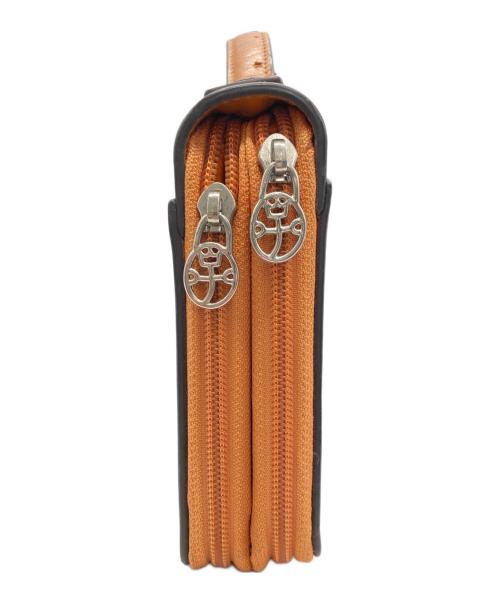 CASTELBAJAC（カステルバジャック）CASTELBAJAC (カステルバジャック) セカンドバッグ オレンジの古着・服飾アイテム