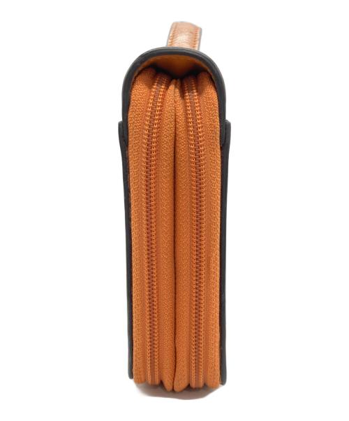 CASTELBAJAC（カステルバジャック）CASTELBAJAC (カステルバジャック) セカンドバッグ オレンジの古着・服飾アイテム