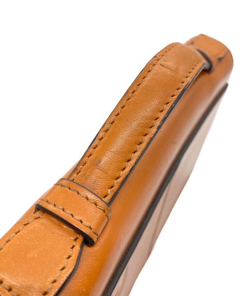 CASTELBAJAC（カステルバジャック）CASTELBAJAC (カステルバジャック) セカンドバッグ オレンジの古着・服飾アイテム