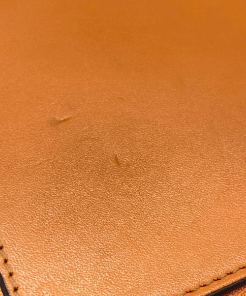 CASTELBAJAC（カステルバジャック）CASTELBAJAC (カステルバジャック) セカンドバッグ オレンジの古着・服飾アイテム