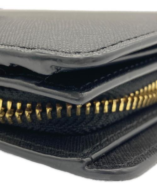 TORY BURCH（トリーバーチ）TORY BURCH (トリーバーチ) 2つ折り財布 ブラックの古着・服飾アイテム