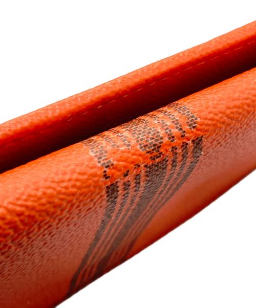 TORY BURCH（トリーバーチ）TORY BURCH (トリーバーチ) 長財布 オレンジの古着・服飾アイテム