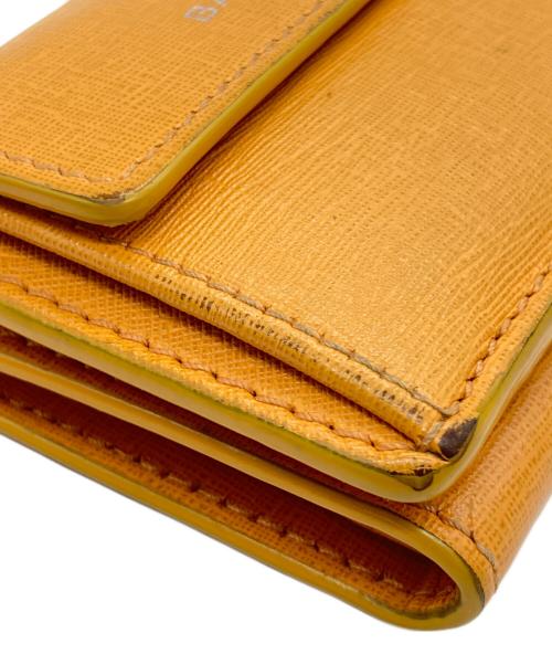 BALENCIAGA（バレンシアガ）BALENCIAGA (バレンシアガ) 3つ折り財布 オレンジの古着・服飾アイテム