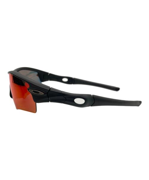 OAKLEY（オークリー）OAKLEY (オークリー) 偏光レンズ(POLARIZED) レッド×オレンジの古着・服飾アイテム