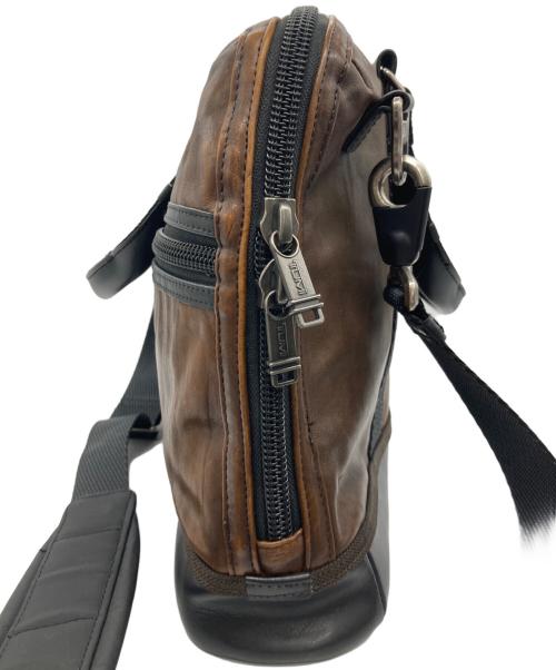 TUMI（トゥミ）TUMI (トゥミ) 2WAYバッグ ブラウン×ブラックの古着・服飾アイテム