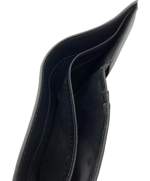 EMPORIO ARMANI（エンポリオアルマーニ）EMPORIO ARMANI (エンポリオアルマーニ) 2つ折り財布 ブラックの古着・服飾アイテム