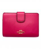 COACHコーチ）の古着「2つ折り財布」｜ショッキングピンク