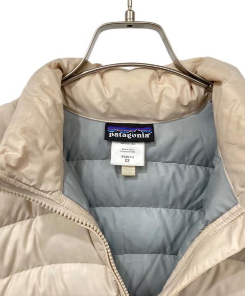 Patagonia（パタゴニア）Patagonia (パタゴニア) ダウンジャケット アイボリー サイズ:XSサイズの古着・服飾アイテム