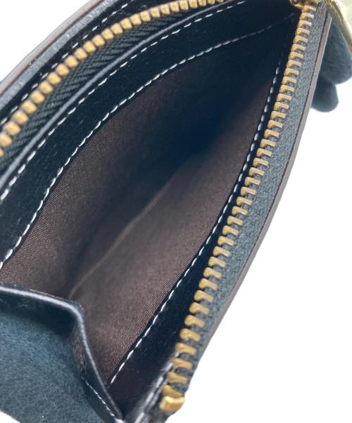 russet（ラシット）russet (ラシット) 2つ折り財布 ブラックの古着・服飾アイテム