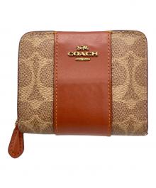 COACH（コーチ）の古着「ビルフォールドウォレット」｜ベージュ×ブラウン