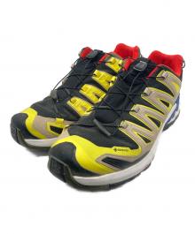 SALOMON（サロモン）の古着「ローカットスニーカー」｜イエロー×ブルー×ホワイト