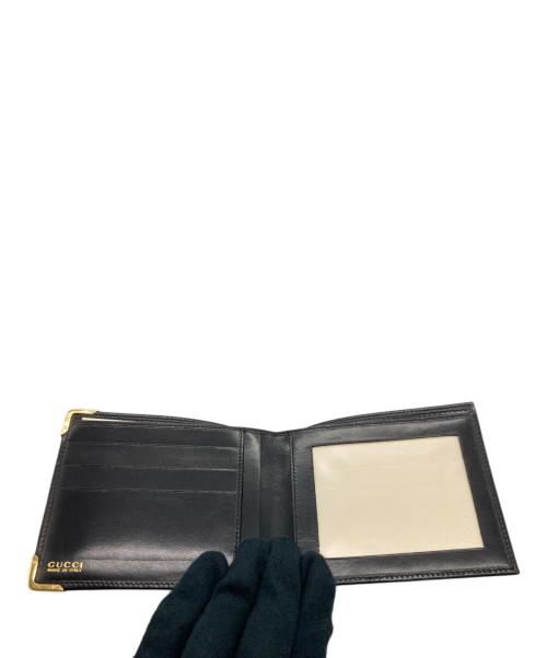 GUCCI（グッチ）GUCCI (グッチ) 2つ折り札入れ ブラック×ゴールドの古着・服飾アイテム